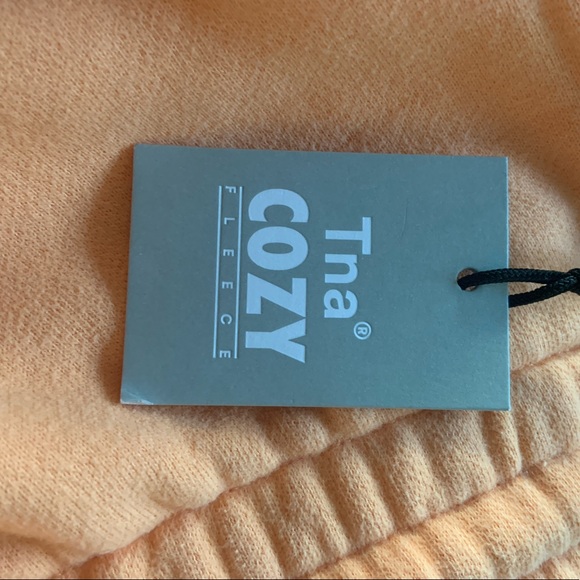 Aritzia Cozy Boyfriend Shorts in the colour apricot - Picture 7 of 9